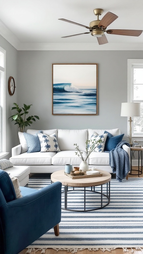 A cozy living room featuring nautical blue accents, with a white sofa, blue pillows, and a striped area rug.